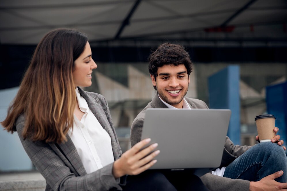 people-with-laptop-outdoors-medium-shot_23-2149005847